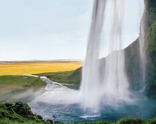 waterfalls at daytime in Geysir Iceland