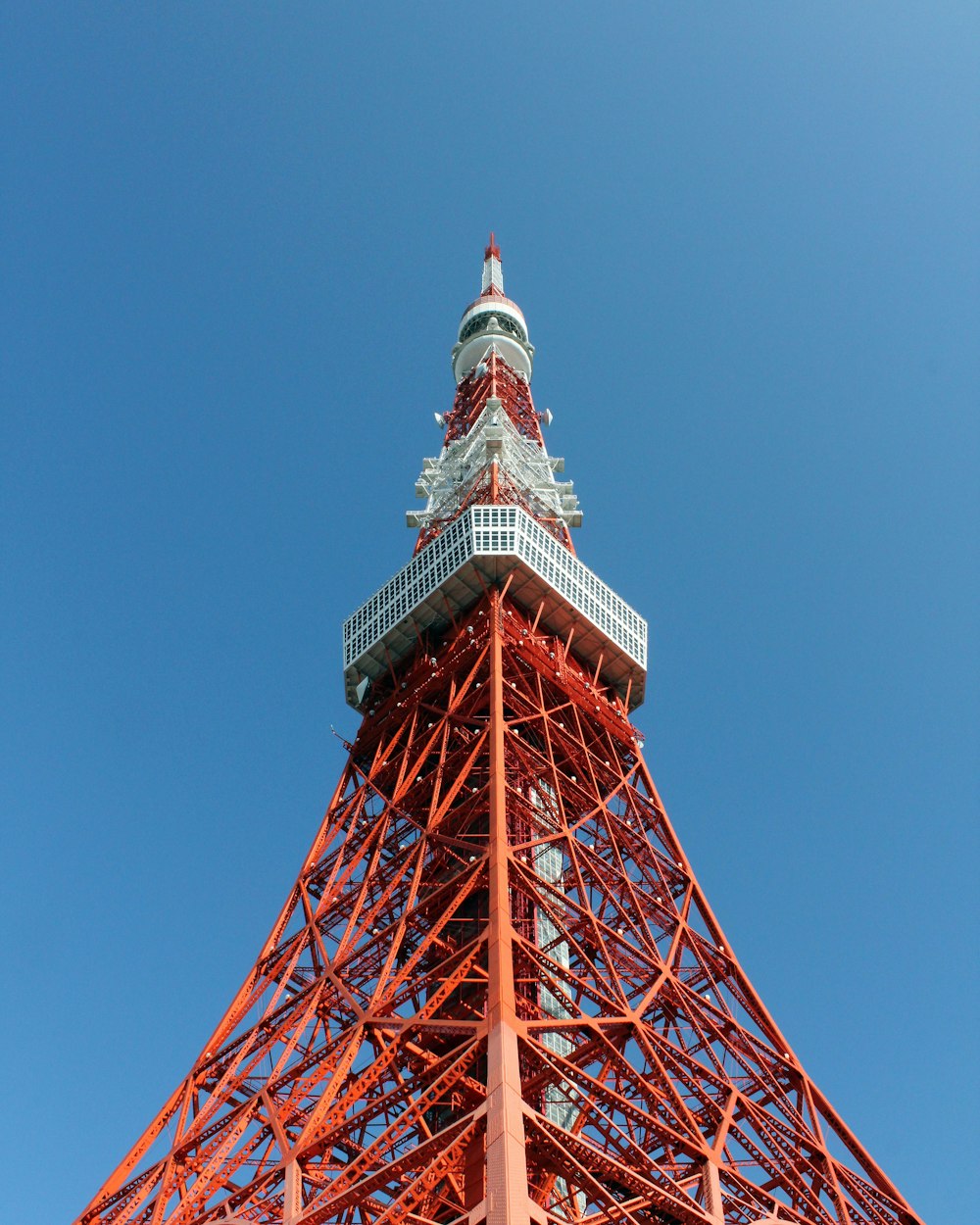 red and white satellite tower