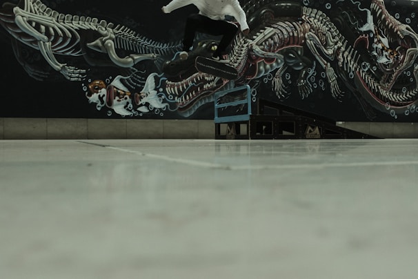 A skateboarder catching air off a ramp.