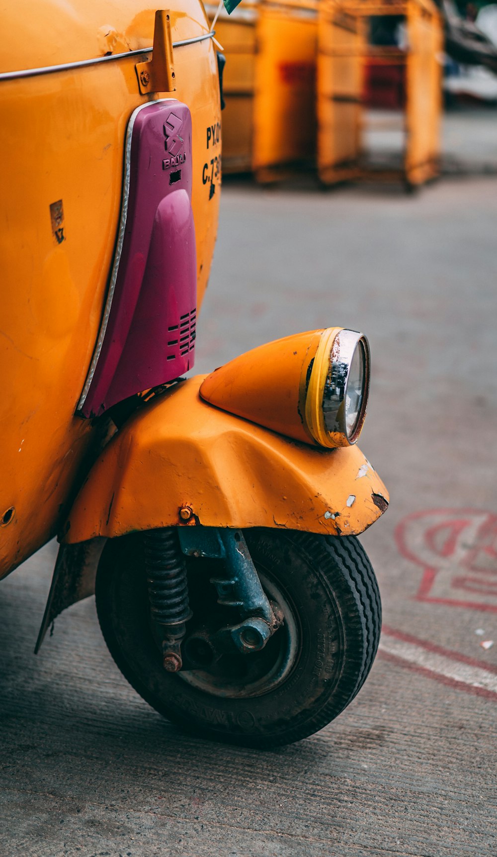orange auto-rickshaw