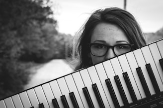 woman holding keyboard