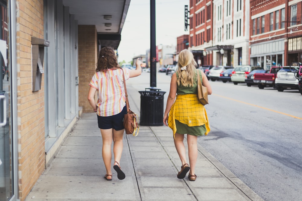 woman walking beside street