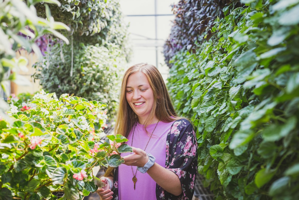 woman between plants