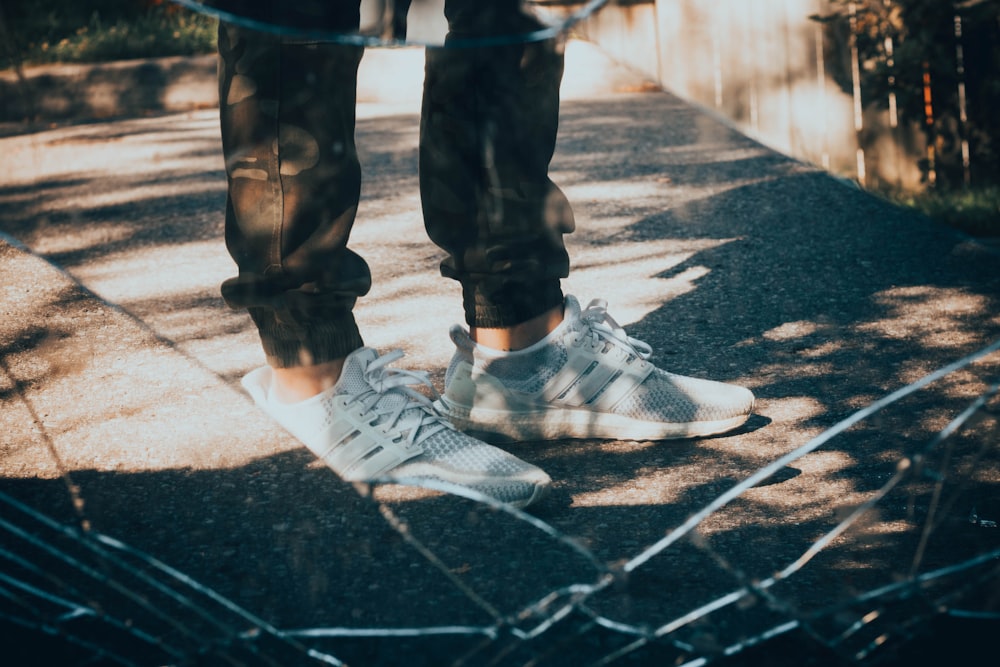 pair of gray running shoes