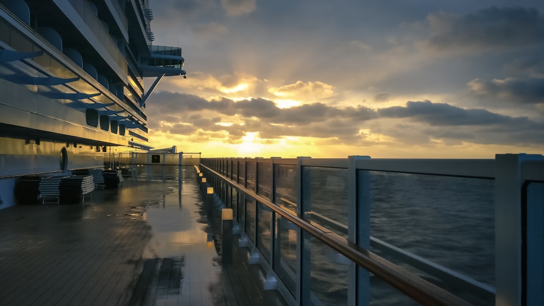 glass terrace beside body of water, Sunrise on the cruise ship MSC Seaside during a drive through the Caribbean in Janua