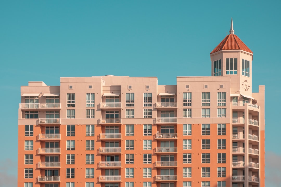 orange and white concrete building at daytime