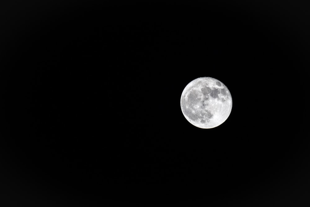 grayscale photography of full moon