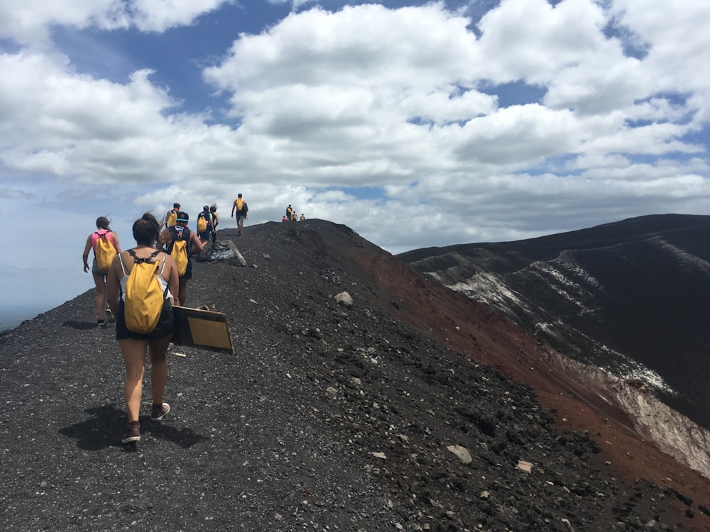 women on top of mountain