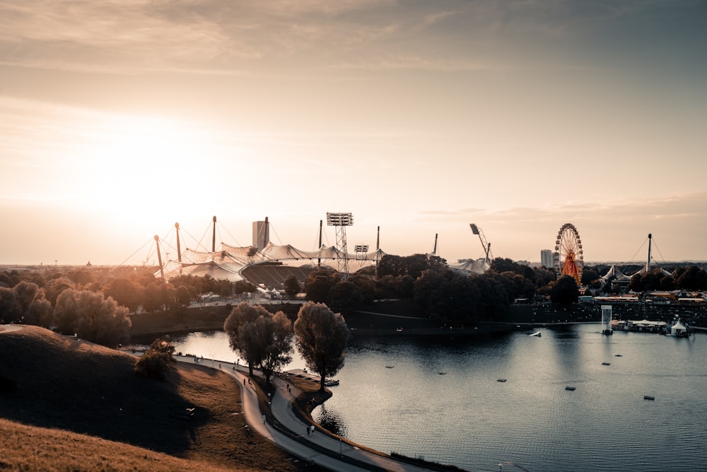 high-angle photo of carnival beside body of water