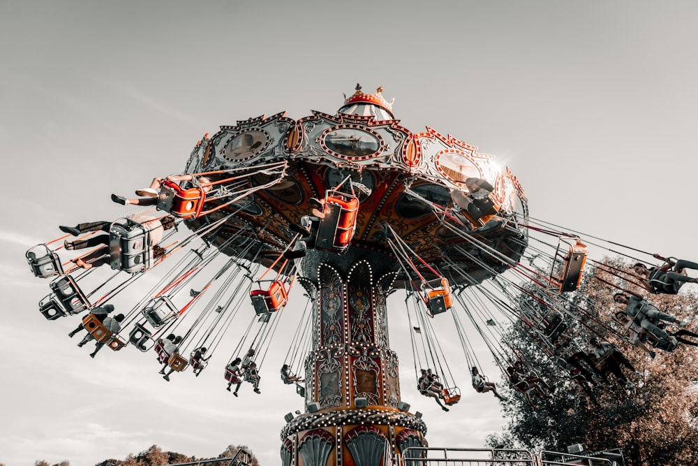 swing amusement ride during daytime