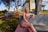 laughing woman sitting on bench