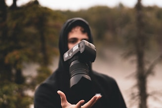 man with DSLR camera