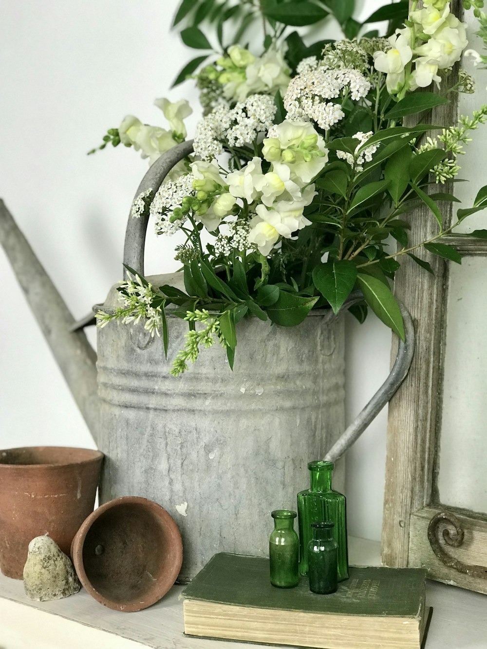 flowers in watering can