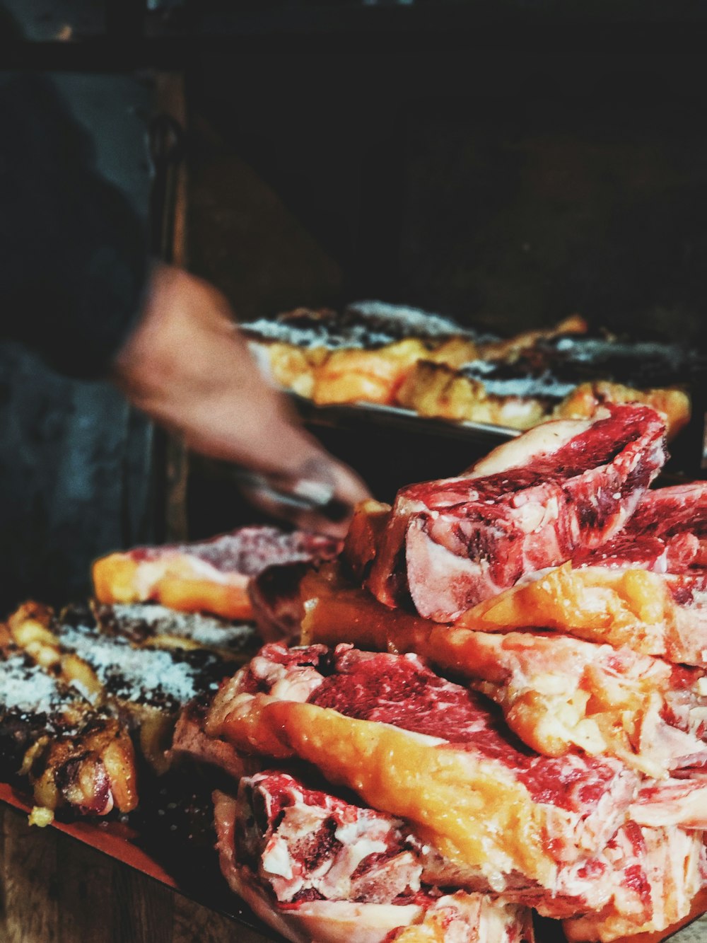 cooked meat on brown table