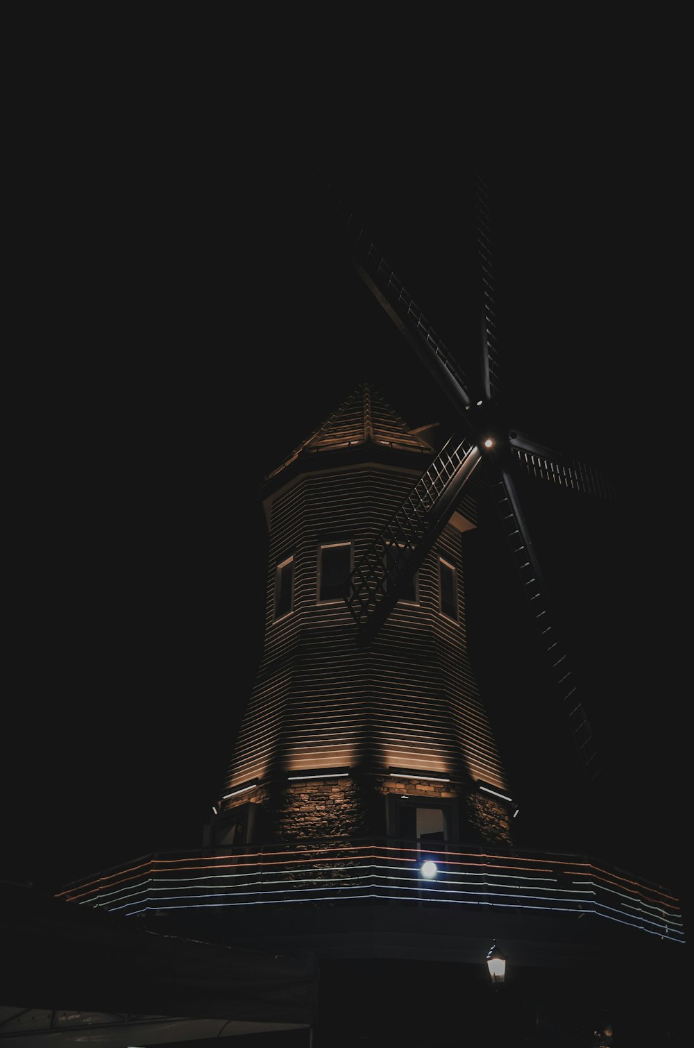 brown wooden windmill