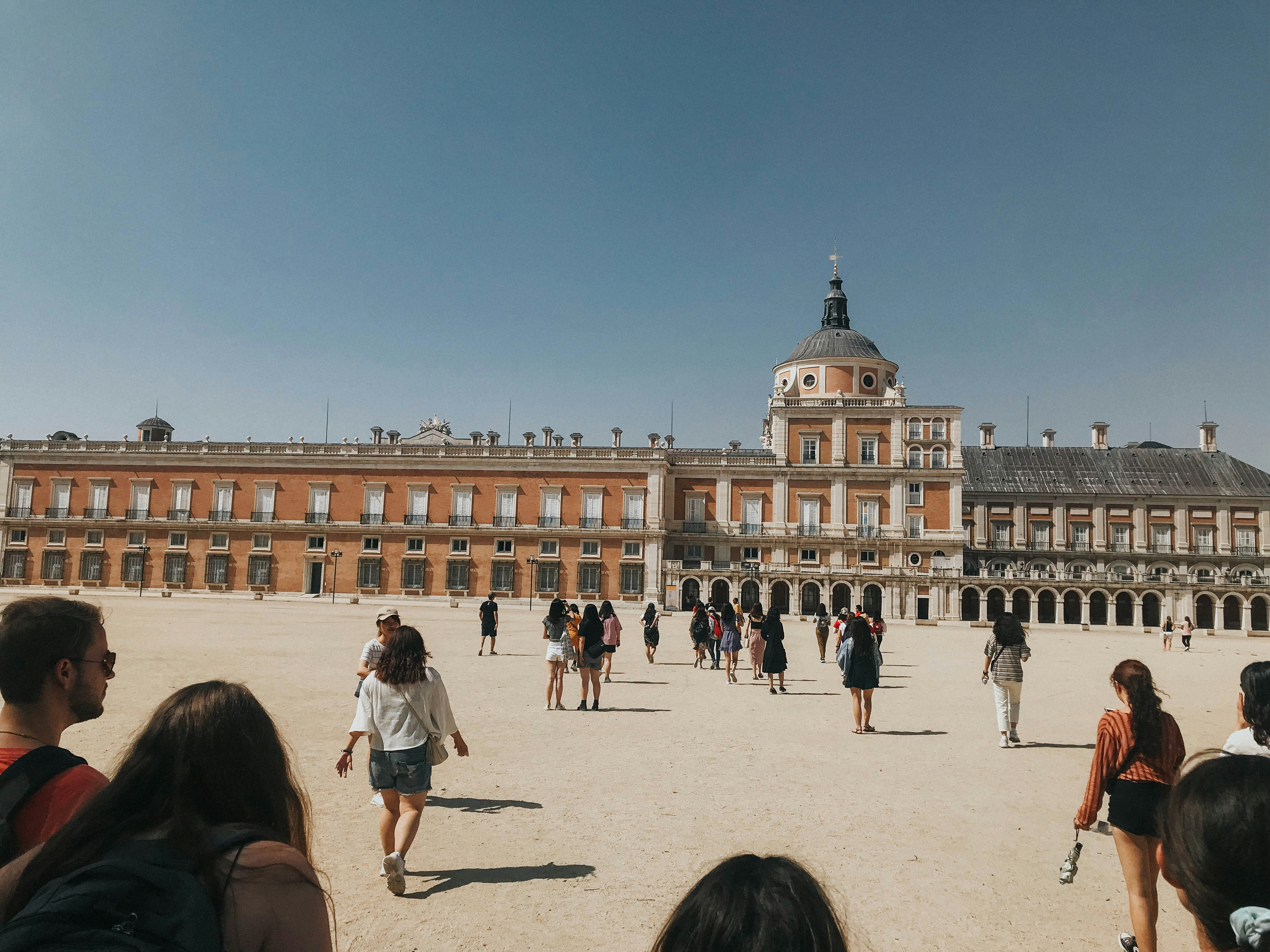 people walking beside building
