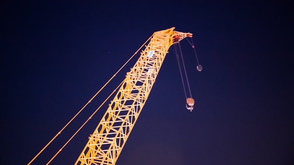yellow metal crane
