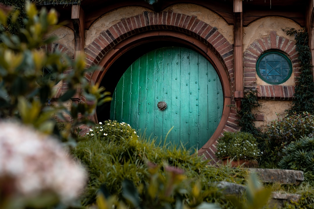 closed green wooden house,