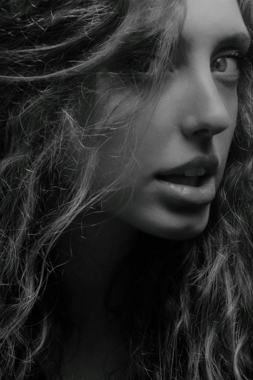 greyscale photography of woman's face