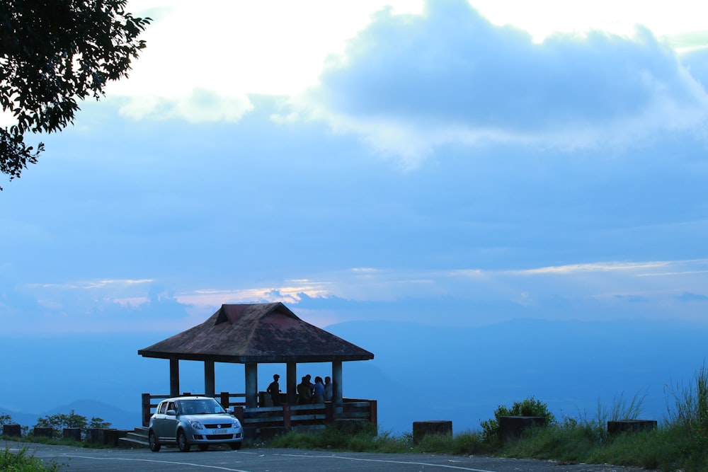 hatchback near gazebo