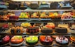 An assortment of custom cakes ready for celebration.