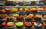 Image of a bakery display filled with special cakes.