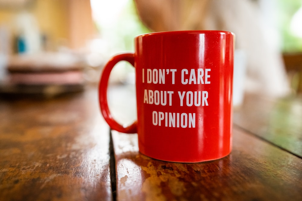 red I don't care about your opinion text mug on table