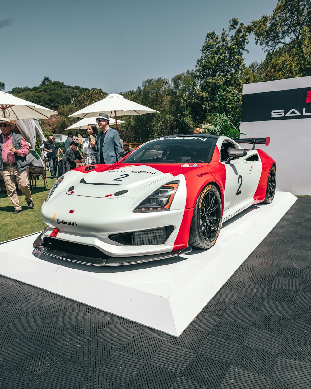 white and red sports coupe