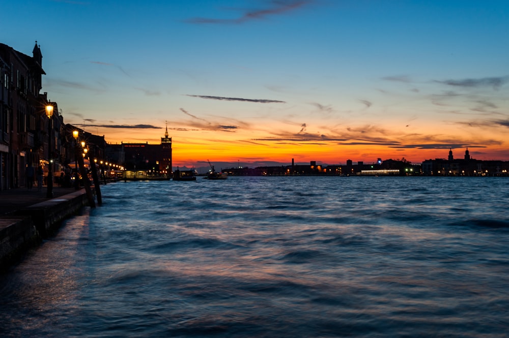 blue body of water during golden hour