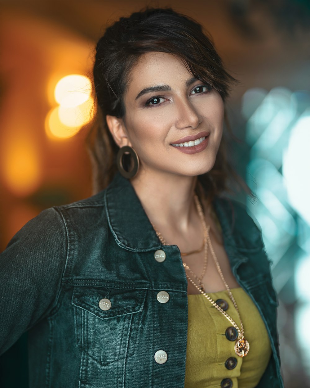 smiling woman wearing denim jacket