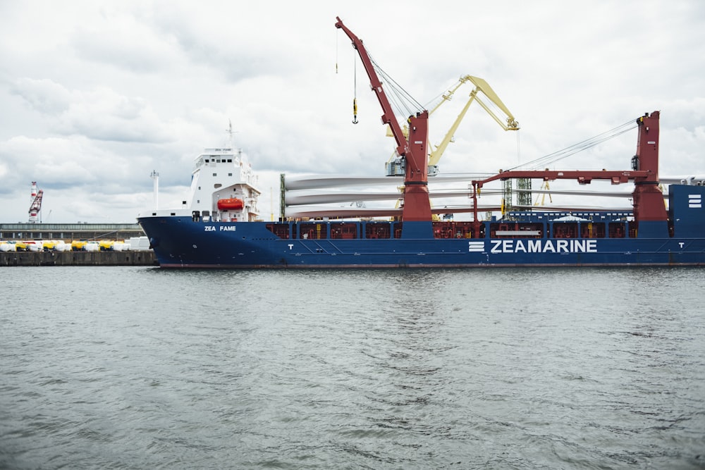 blue and red Zeamarine ship during daytime