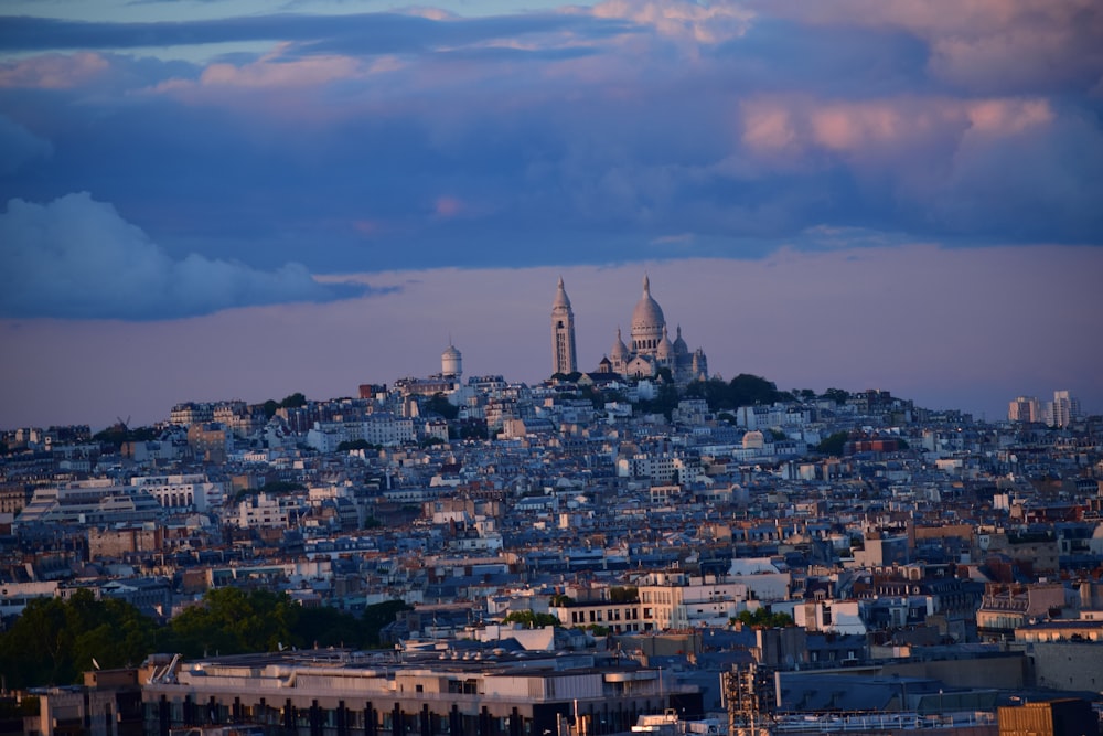 a view of a city from a hill