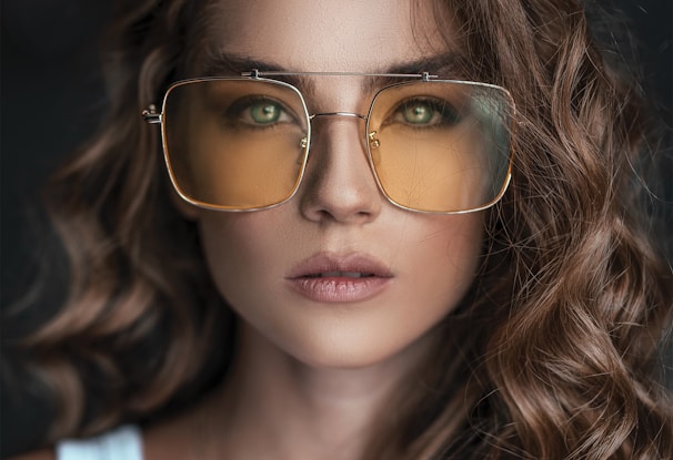 woman wearing brown sunglasses