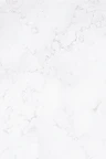 a close up of a white marble surface