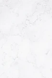 a close up of a white marble surface