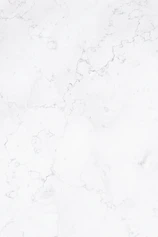 a close up of a white marble surface