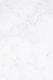 a close up of a white marble surface