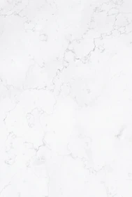 a close up of a white marble surface