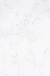 a close up of a white marble surface