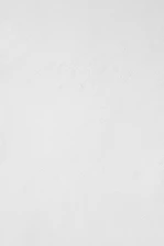 a man riding a snowboard down a snow covered slope