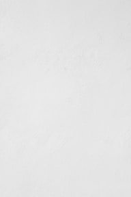 a man riding a snowboard down a snow covered slope