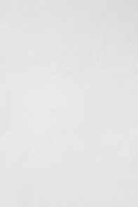a man riding a snowboard down a snow covered slope