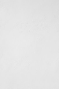 a man riding a snowboard down a snow covered slope