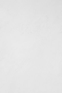 a man riding a snowboard down a snow covered slope