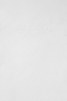 a man riding a snowboard down a snow covered slope