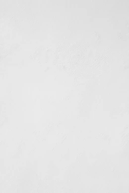 a man riding a snowboard down a snow covered slope