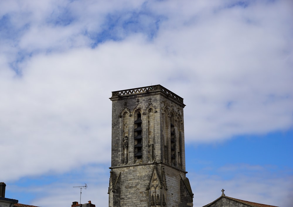 a tall tower with a clock on top of it