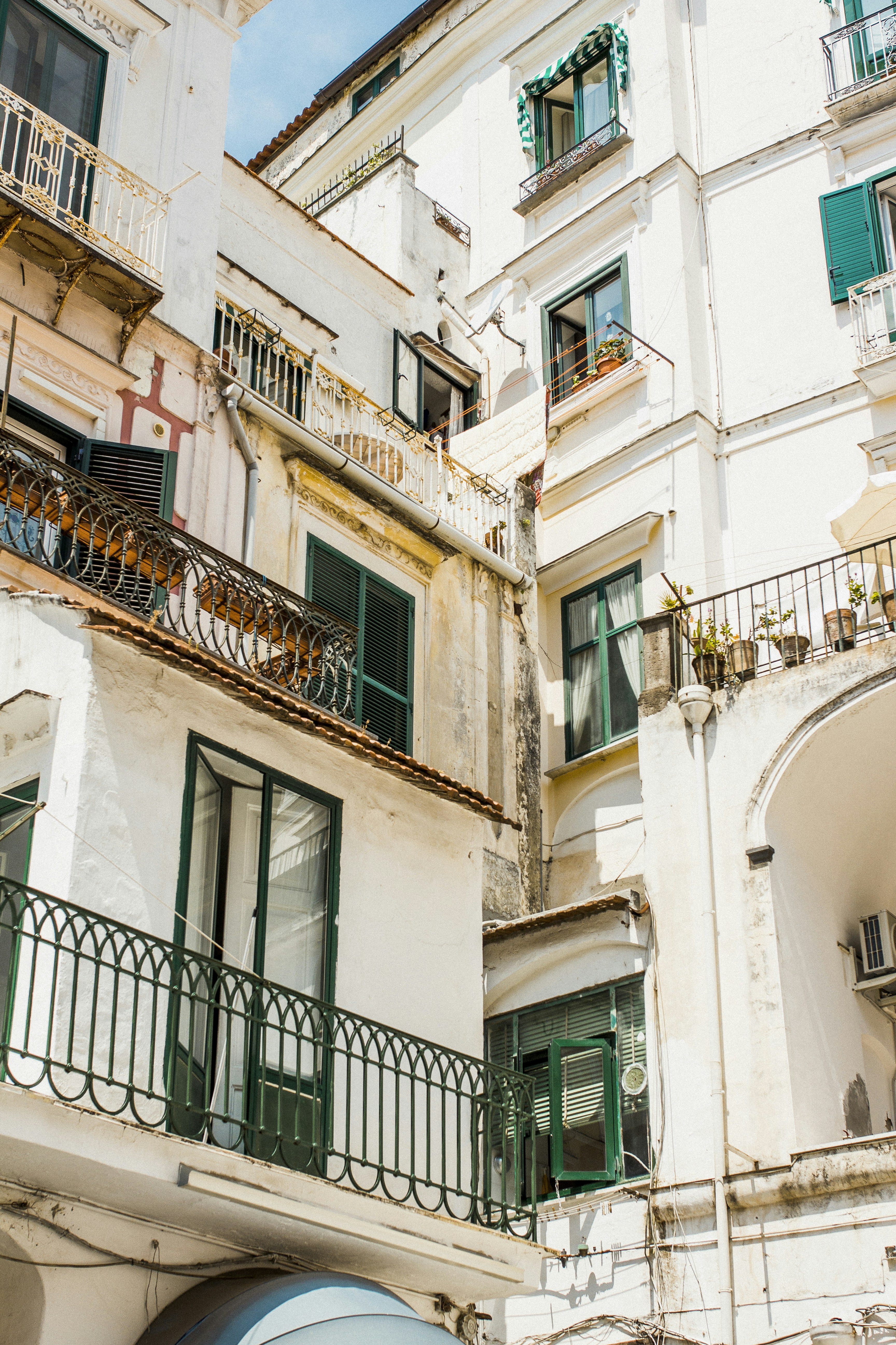 white and green concrete building during daytime
