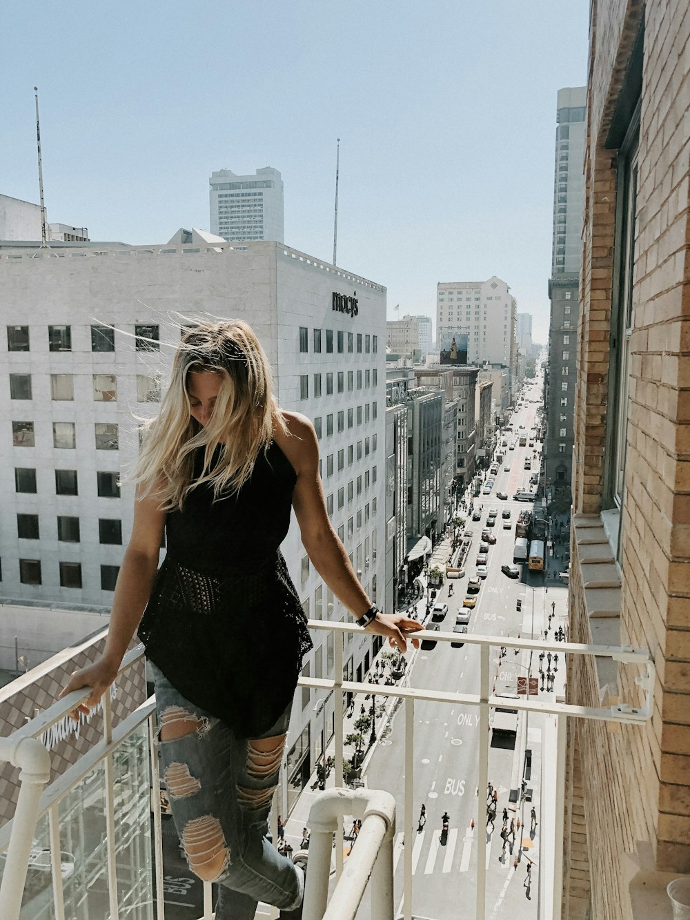 woman standing near ledge