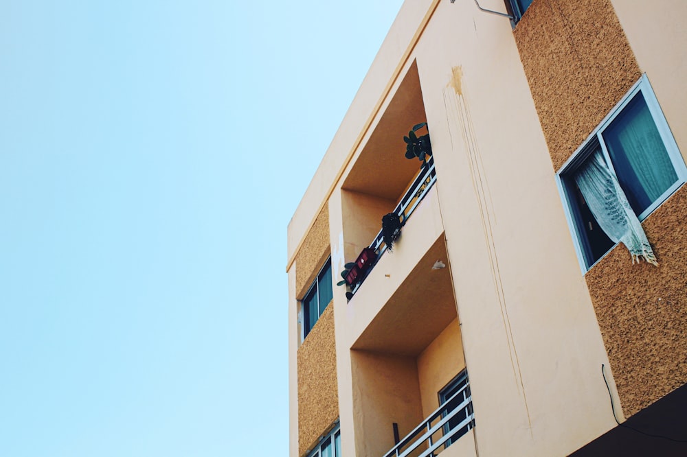 brown concrete building at daytime